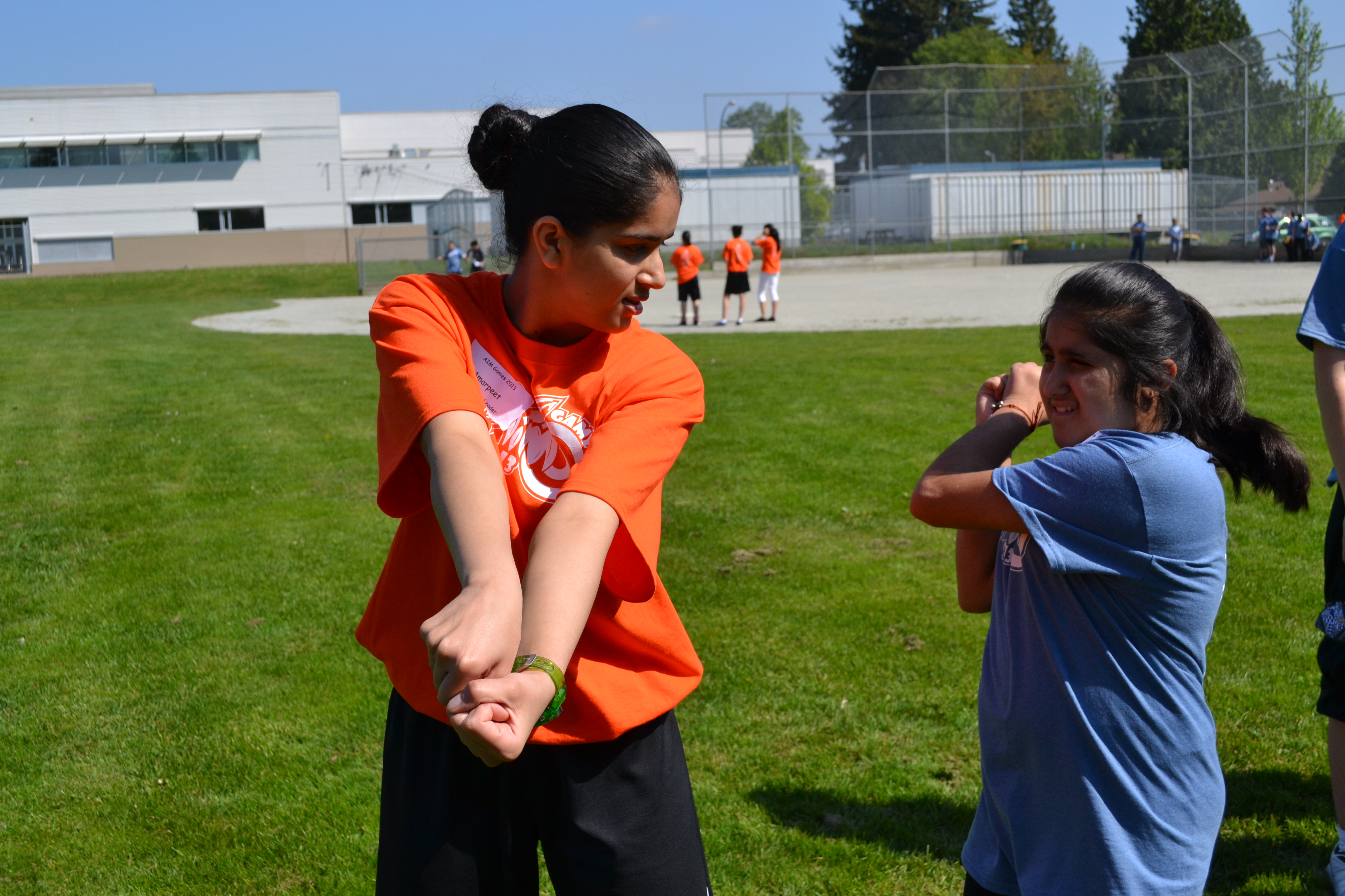 volunteer-teaches-batting.51657a64246.JPG